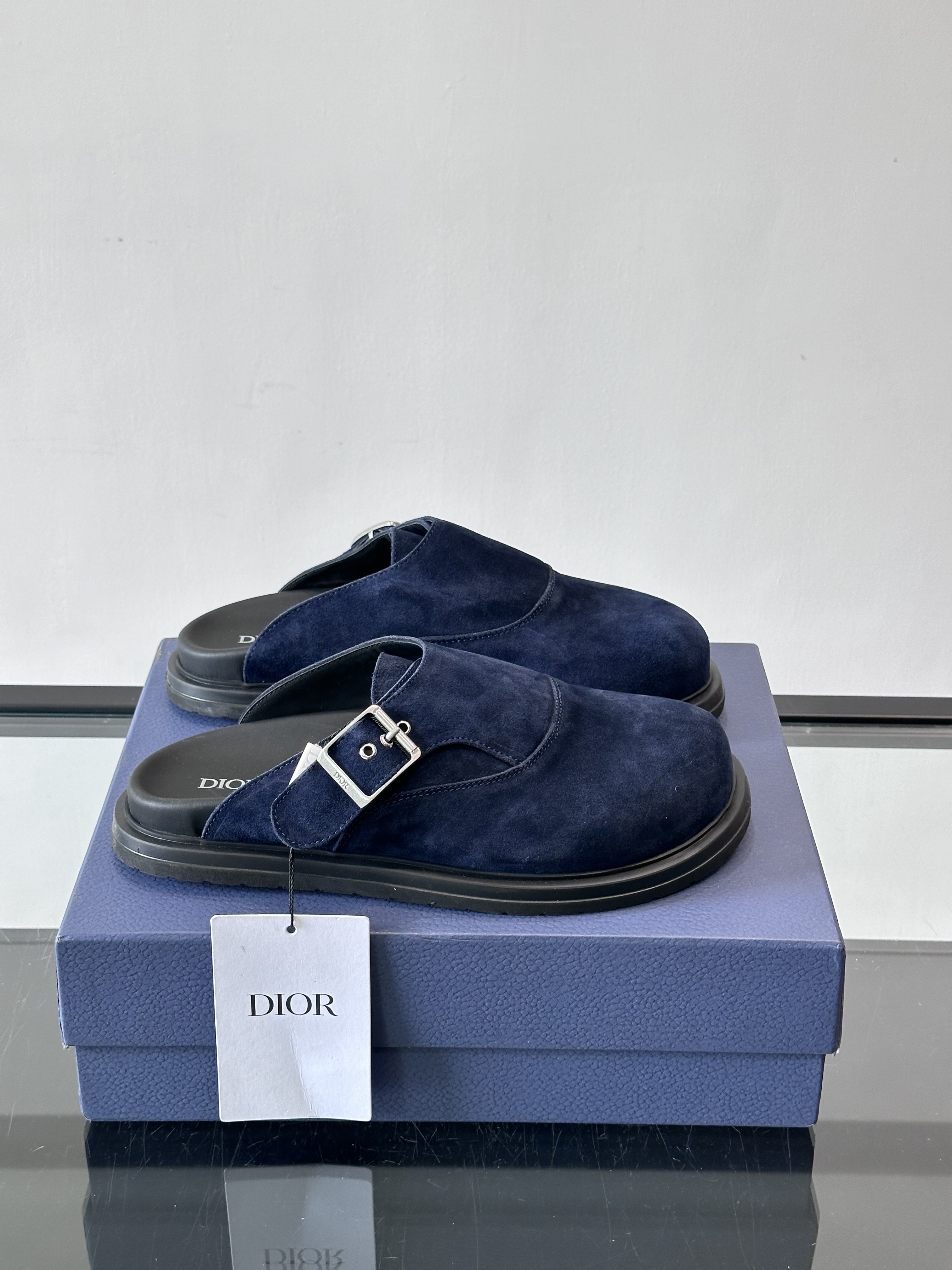 Bagsaaa D10r blue mules with silver buckle
